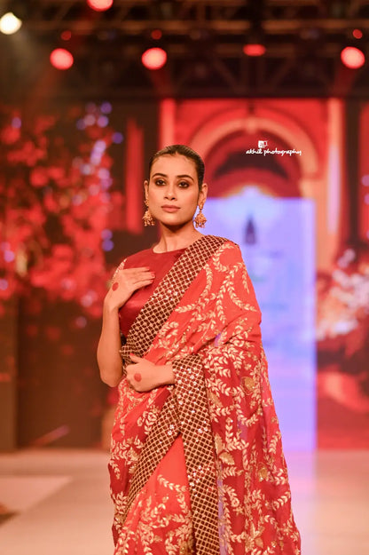 Regal Rust Red Hand-Embroidered Saree with Gold Zari Work