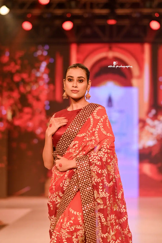 Regal Rust Red Hand-Embroidered Saree with Gold Zari Work